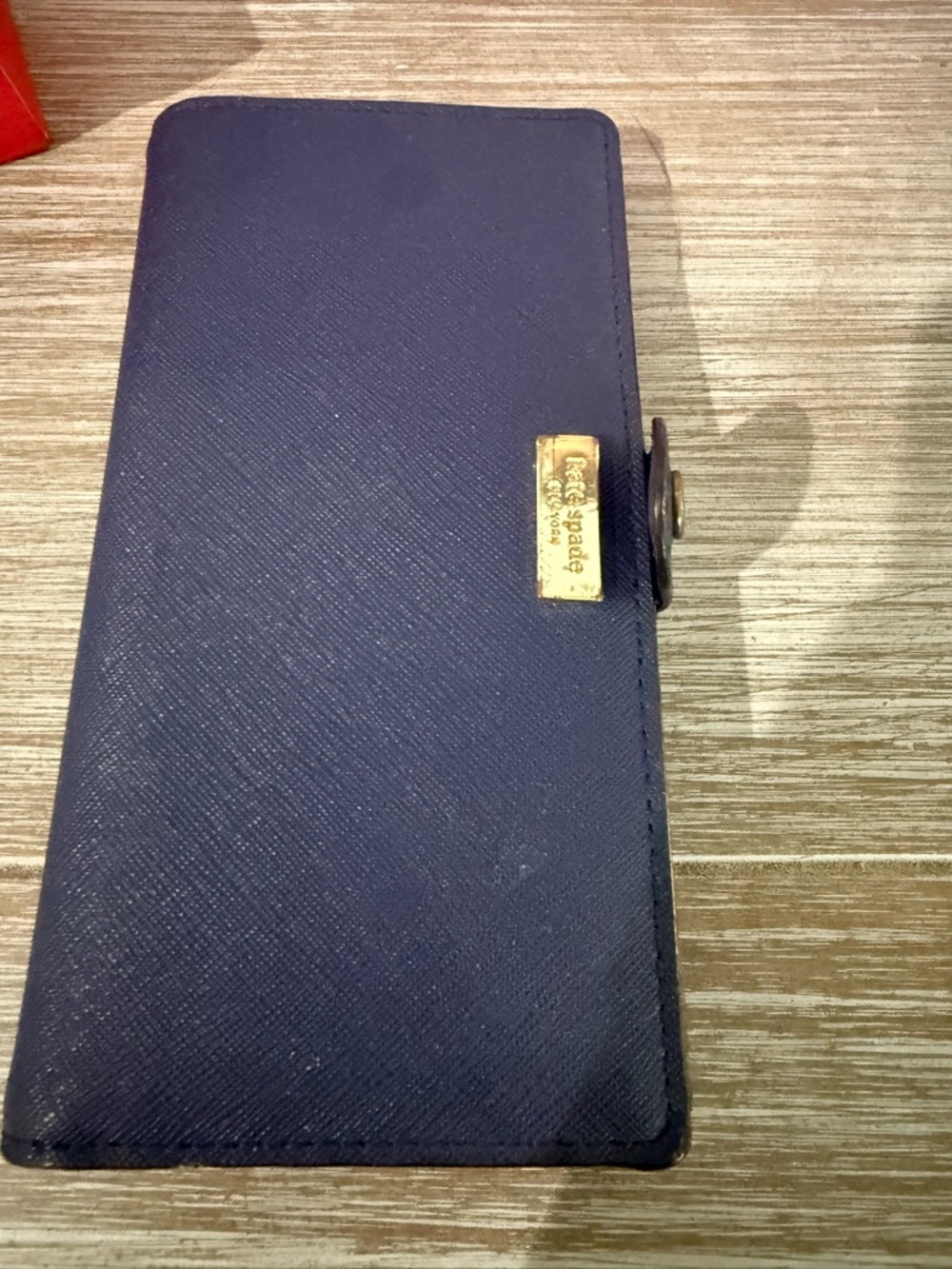 kate spade navy saffiano leather continental wallet with gold hardware